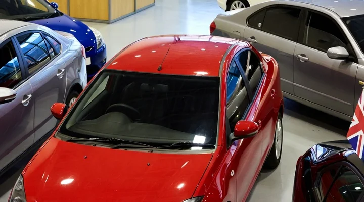 Red car in the Nice Cars showroom